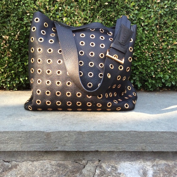 prada grommet bag